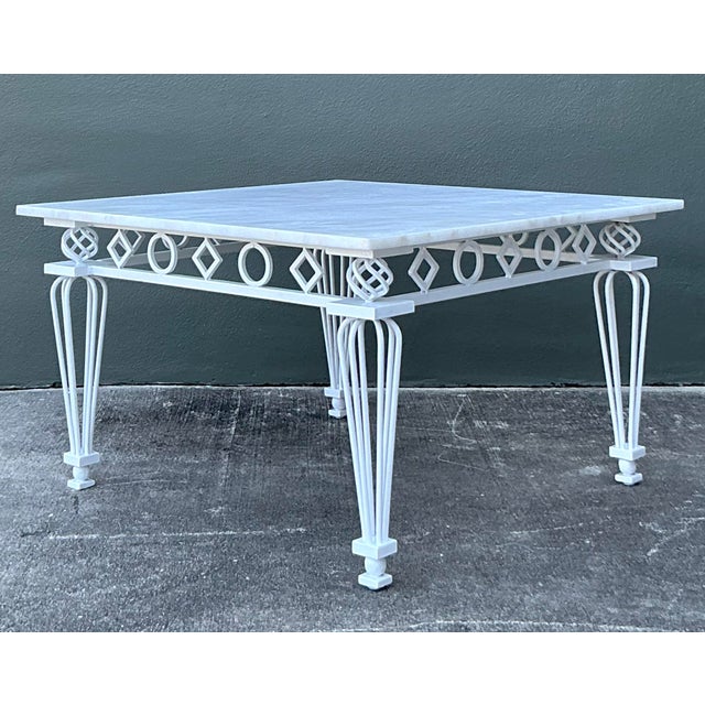 Channel the breezy elegance of a Palm Beach villa or a lush garden conservatory with this sophisticated vintage coffee...