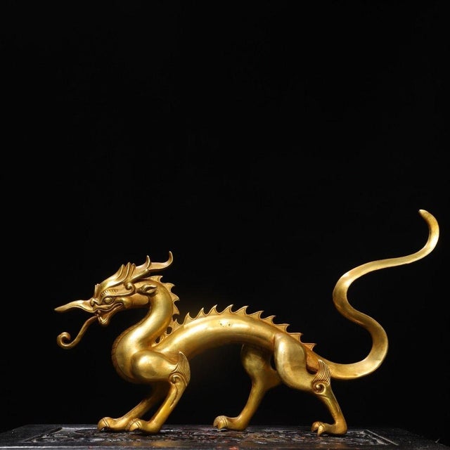 This is an elegant and dynamic vintage statue of a Chinese dragon (Long), crafted from copper and finished with a bright,...