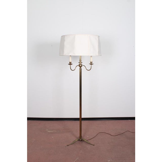 Beautiful brass floor lamp 1950s Stilnovo style with 4 lights. Wear consistent with age and use. European Plug (up to...