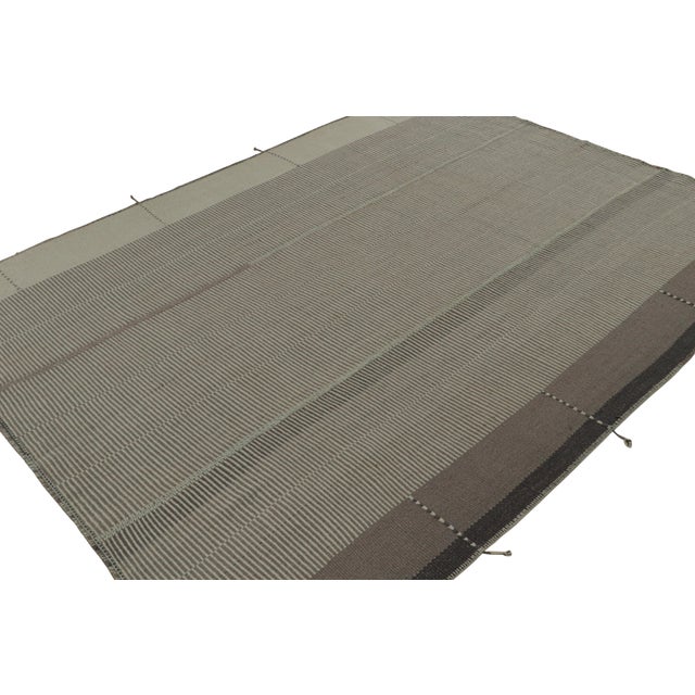 Handwoven in wool, a 9x12 Kilim design from an inventive new contemporary flat weave collection by Rug & Kilim. On the...