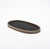 The Kifu Paris Oval Tray in black shagreen exemplifies contemporary luxury with its textured, hand-crafted surface and...
