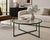 A sleek vintage round coffee table featuring a deep Emerald City green geometric metal frame and clear glass top. Airy,...
