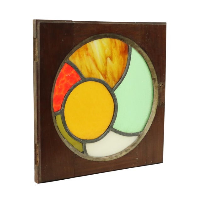 Nice and colorful stained glass panel, leaded glass mounted in a lacquered wooden frame, originally part of a door or...