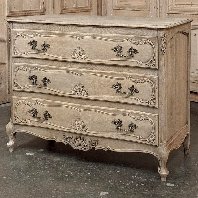 Inspired by the storied cabinetry of Liège, this beautifully crafted oak commode reflects the graceful movement of the...