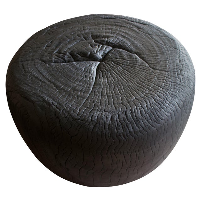 Hand carved from a single suar wood root, a beautiful drum shaped coffee table. The top is 24” dia and the outer sides...