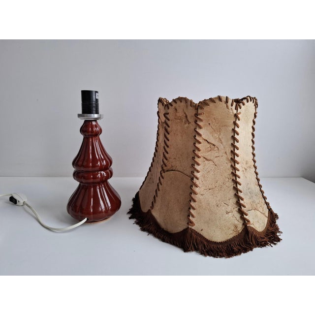 Vintage table lamp produced in central europe during the 1980s, featuring a sculptural glazed ceramic base paired with a...