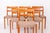Set of 8 Vintage “Garmi” Dining Chairs by Nils Jonsson for Troeds, Sweden, 1960s Bring timeless Scandinavian elegance to...