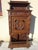 Small storage cabinet, finely hand-carved French. Originating from Brittany, depicting a scene of daily life in bas-...