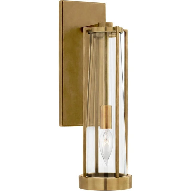 Calix Bracketed Sconce in Hand-Rubbed Antique Brass with Clear Glass Designer: Thomas O'Brien Height: 16" Extension: 6.5"...