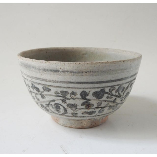 16th century bowl from the Si Satchanalai (Sawankalok) region of north-central Thailand. Stoneware with underglaze...