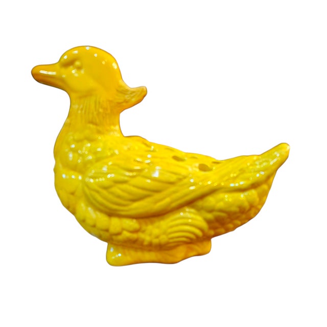 This is an original ceramic Flower Frog Vase in the shape of a very unique Farmhouse-esque style yellow duck created by...