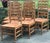 Charming set of rustic dining chairs featuring rare 6 rung Ladderback construction! Heavily distressed throughout for a...