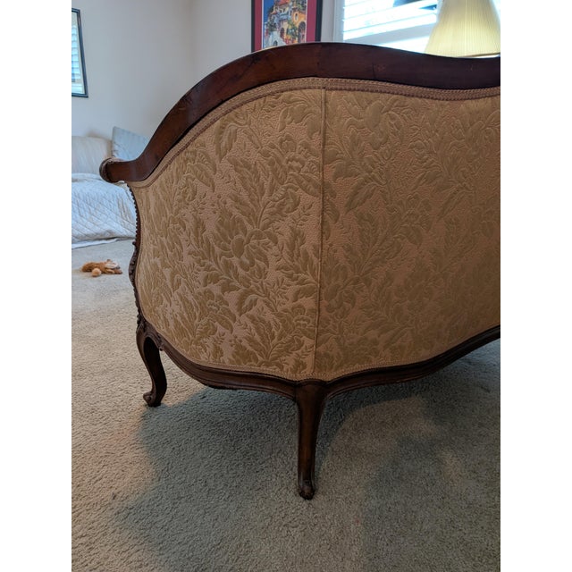 Most likely a Louis XV-style (French Provincial/Rococo Revival) canapé or settee from early 20th century (potentially late...