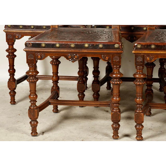 Spanish Revival Leather Embossed Carved Dining Chairs-Set of 6 Set of 6 Vintage Spanish Carved Walnut and Tooled Leather...