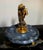 This item is a 19th-century Victorian novelty figural pocket watch stand and vide-poche (trinket tray).The piece features...