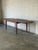 This elegant dining table features a streamlined silhouette and subtly tapered legs. Its clever design incorporates two...