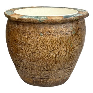 Early 20th Century Brown Glazed Ceramic Planter with Carved Relief Pattern For Sale