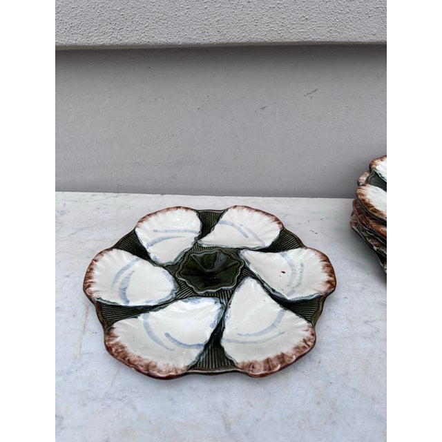 French Majolica oyster plate signed Longchamp, circa 1900.