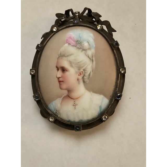 Royal Vienna Porcelain Oval Miniature DESCRIPTION Painted in coloured enamels with a bust portrait of a young lady wearing...