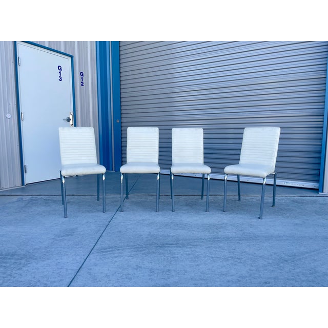 Vintage chrome dining chairs designed and manufactured in the United States circa 1970s. These fantastic chairs feature...