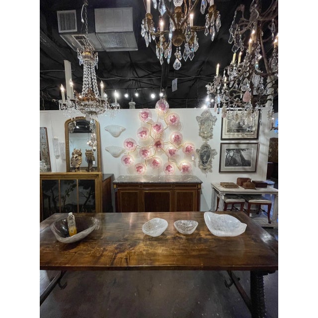 Spectacular modern purple Murano glass flower form wall art on a brass frame. Beautiful delicate flowers that are lit from...