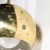 This exquisite Mid-Century Modernist brass pendant chandelier epitomizes the elegant design sensibility of the 1960s....