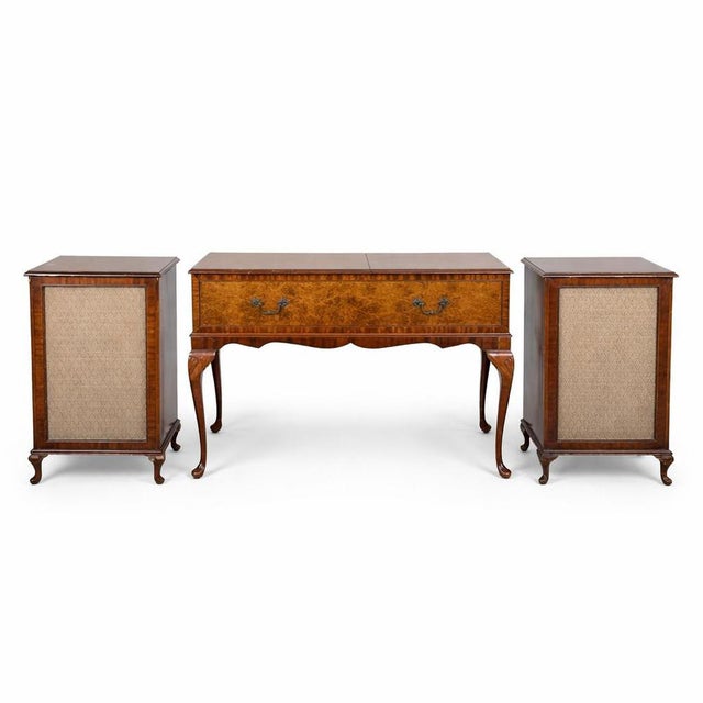 A beautiful vintage Dynatron radiogram with matching stereo speakers, housed in an elegant walnut cabinet with burr walnut...