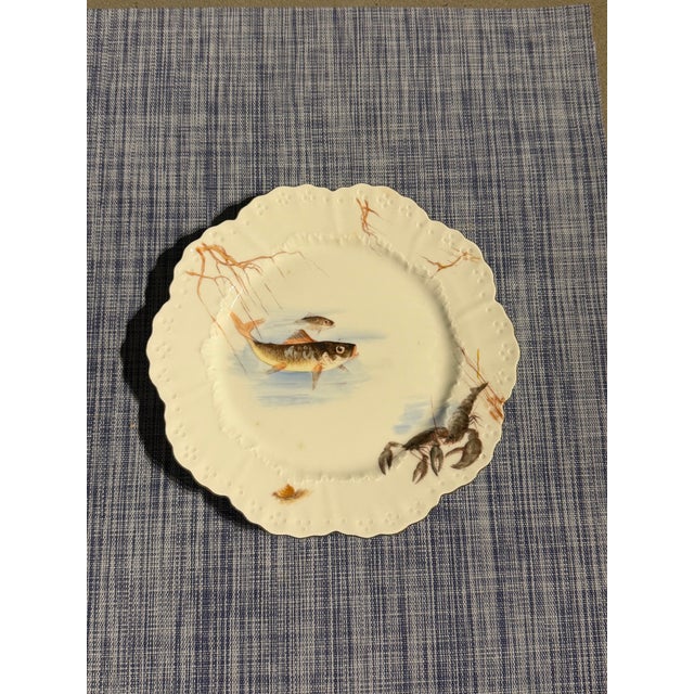 Antique French Limoges porcelain fish service, factory-decorated by William Guérin & Co. of Limoges, France, ca....
