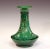 Antique Awaji bottle vase in deep green monochrome glaze with incised spray of well drawn bell flowers, circa 1910s....