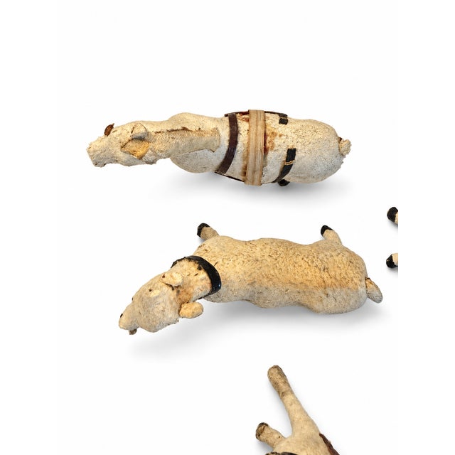 An exceptional, highly collectible lot of 11 antique German hide-covered miniature farm animals, dating from the late 19th...
