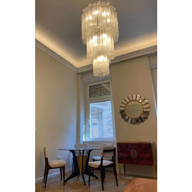 Amazing Chandelier with precious 48 tronchi Murano glass 40 cm long. Measures: Diameter 60 cm, height 110 cm. 16 lights....