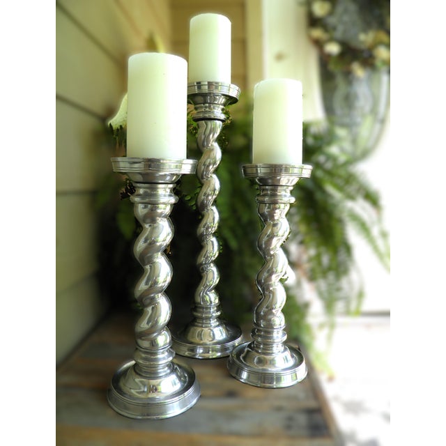 Quality Set of 3 Cast Aluminum Weighted Barley Twist Pillar Candle Holders This item is most likely from Bombay Co. or...
