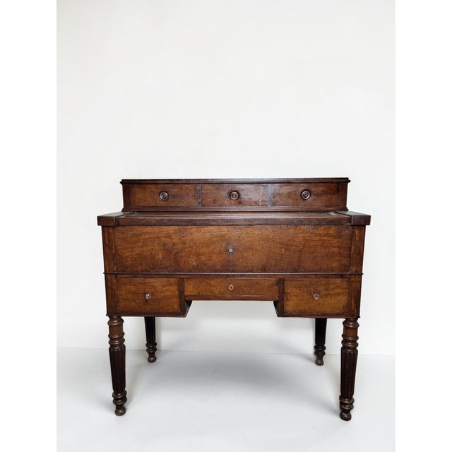 Louis Philippe period 19th century oak stepped desk. Mechanical push-to-open mechanism. It is in good condition. There are...