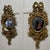 A Pair of Oval Rococo Gilt Wall Mirrors Each of the Mirrors have an exquisite gilt Frame in the Rococo Style, they have a...