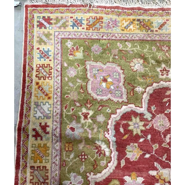 Handmade vintage Turkish Oushak rug in traditional design and natural dyes. Te rug is from the beginning of 20th century...