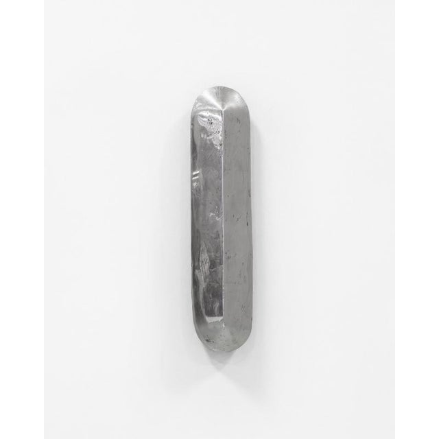 Lv wall sconce in cast aluminum by pietro franceschini. Dimensions: w 13 x d 13 x h 60 cm. Materials: cast aluminium. This...