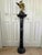 Offering for sale this vintage black with white veined marble pedestal with the following features: - Both top and base...