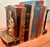 These Antique Bookends were produced by the Armor Bronze Company in 1922. The feature the classical Greek mythological...