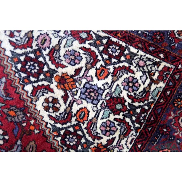 Handmade vintage Persian Bidjar woolen rug. The rug is from the end of 20th century, it is in original good condition. The...