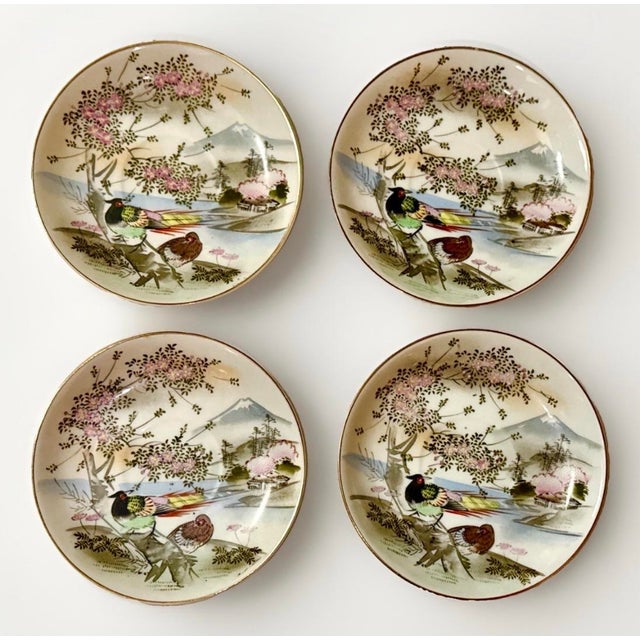 Four (4) Hand-Painted Japanese Kutani Saucer Plates. Each plate measures 5 1/2" and is a rare and beautiful piece of...
