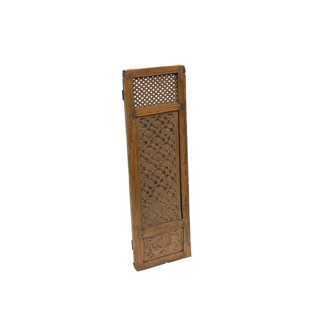 This antique Chinese wooden window shutter panel showcases exquisite craftsmanship through three distinct decorative...