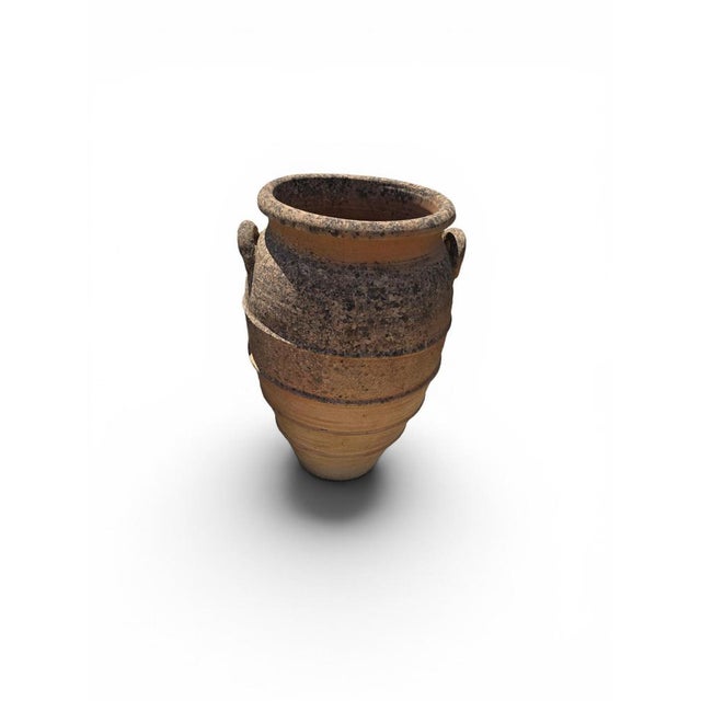 Impressive large-scale Italian terracotta storage jar dating from the 1950s, featuring two elegant side handles and a...