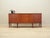 The sideboard was made in the 1960s, Danish production. The structure is covered with teak veneer, the top is partly...