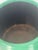 Antique American folk art wood bucket painted bright green with cow collage.