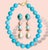 This Howlite necklace is the perfect shade of beachy turquoise and is great for any getaway. Adjustable length 16-18" 17mm...