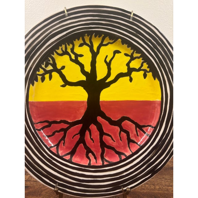 A one-of-a-kind original ceramic art plate by nationally recognized American artist John E. Buck, signed and dated 2001....