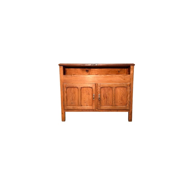Central sideboard in larch wood from the early 1900s, characterized by a double-sided structure, ideal for being...