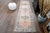 Vintage Hand-Knotted runner rug is a semi-antique vintage runner rug. The '70s Eastern region of Anatolian's unique rug is...
