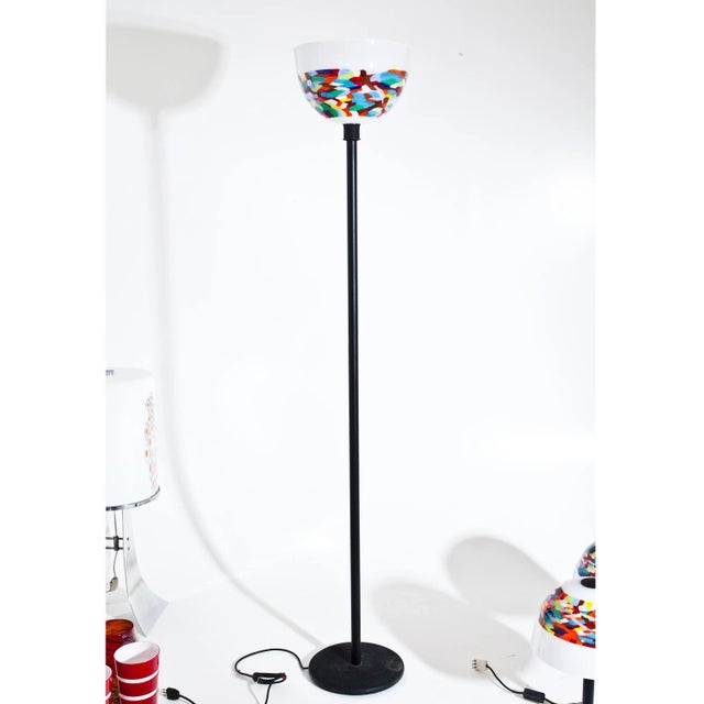 Floor lamp on black base and white-colored Murrine glass shade. For electrification, we assume no liability and no...