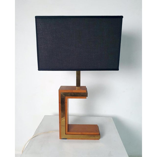 This 1970s Mid-Century Modern design lamp was made by the renowned architect Giacomo Sinopoli for Liwans of Rome, Italy....